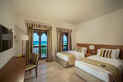 sifawy Boutique Hotel - Sifah, Oman. Apartment Twin bedroom.